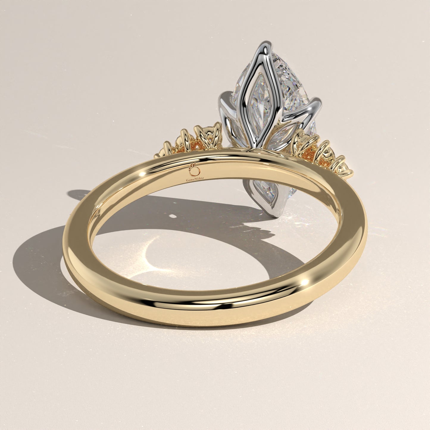 The Oval Claw Solitaire with Clustered Round Shoulder Stones Engagement Ring