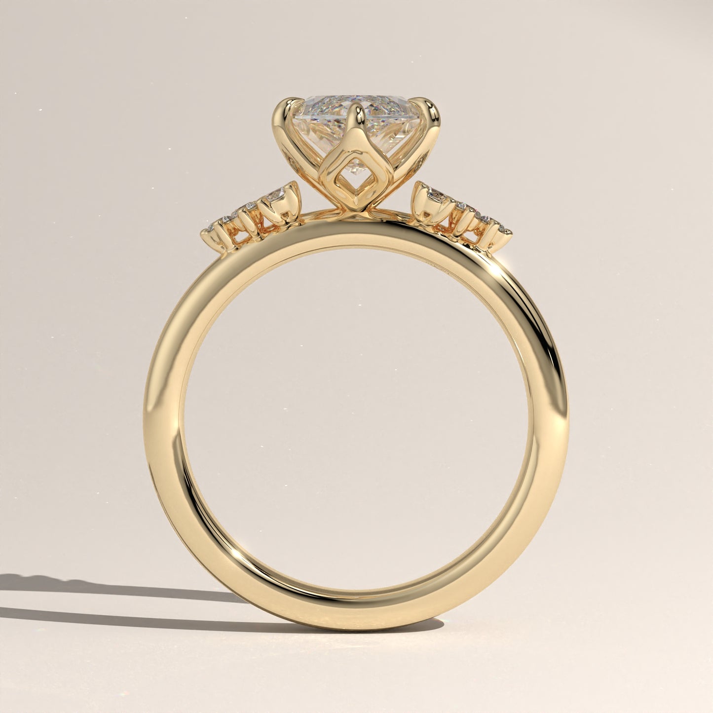 The Oval Claw Solitaire with Clustered Round Shoulder Stones Engagement Ring
