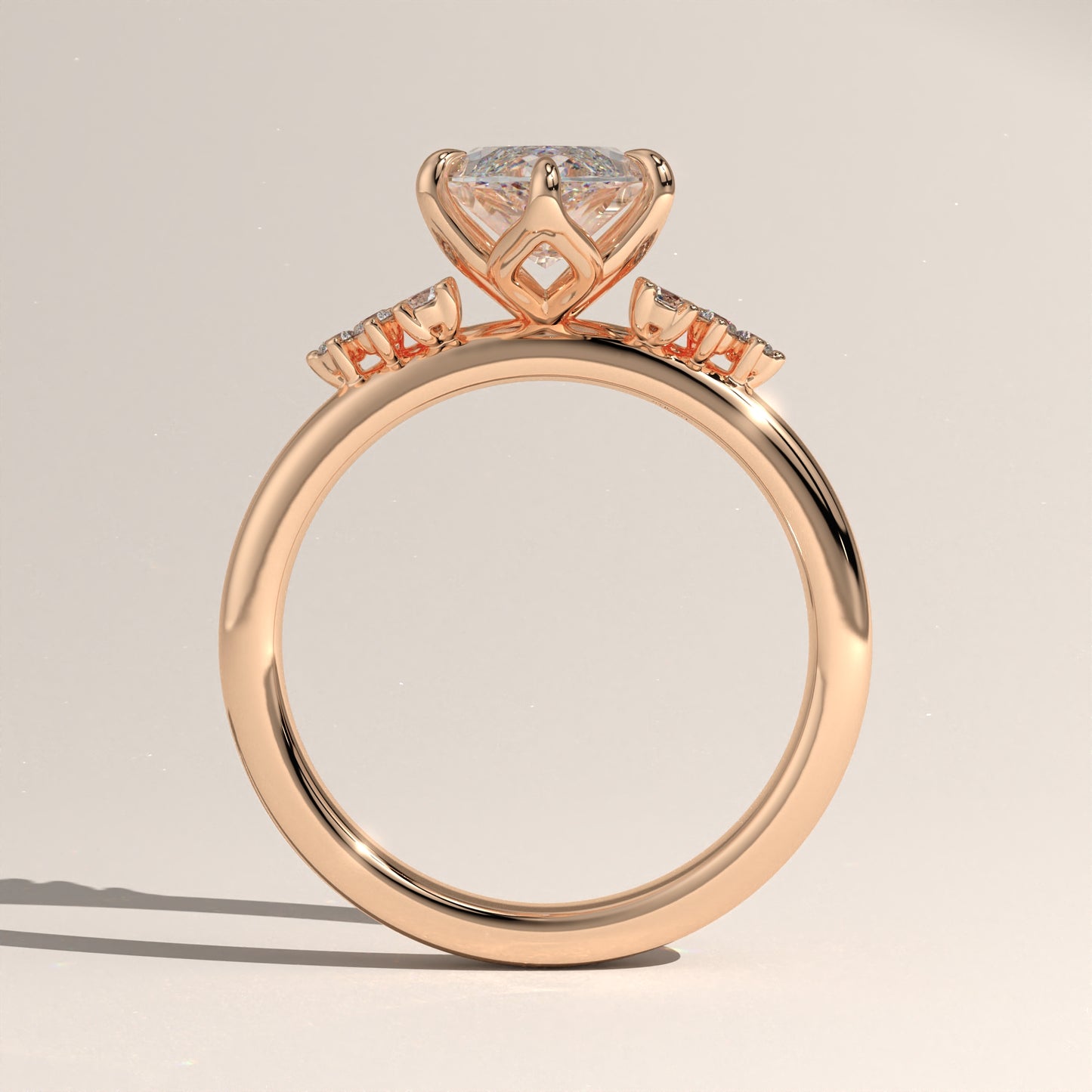 The Oval Claw Solitaire with Clustered Round Shoulder Stones Engagement Ring