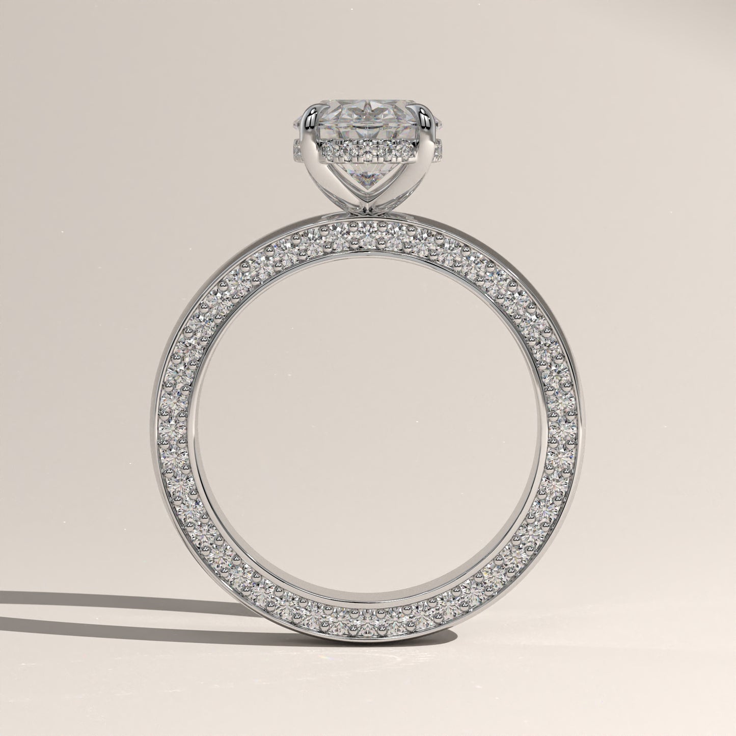 The Solitaire Cigar Pavé Band Oval Engagement Ring