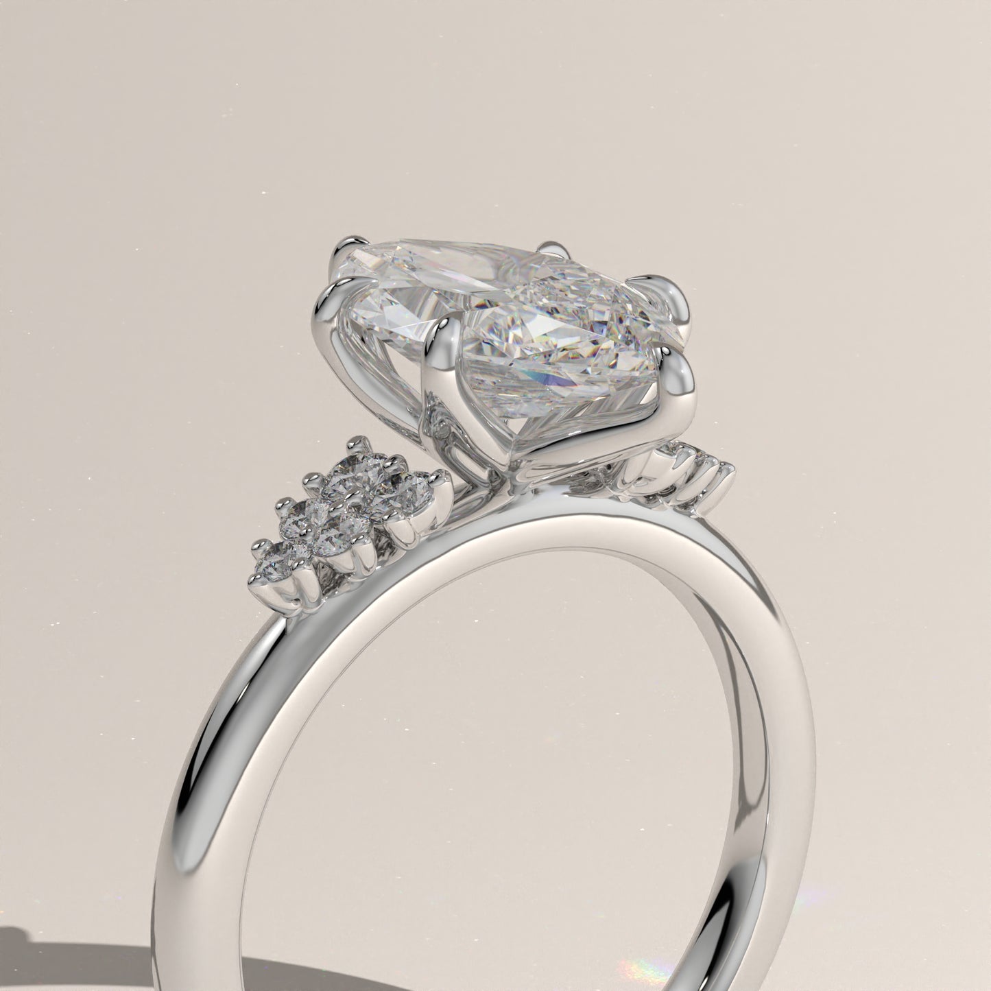 The Oval Claw Solitaire with Clustered Round Shoulder Stones Engagement Ring