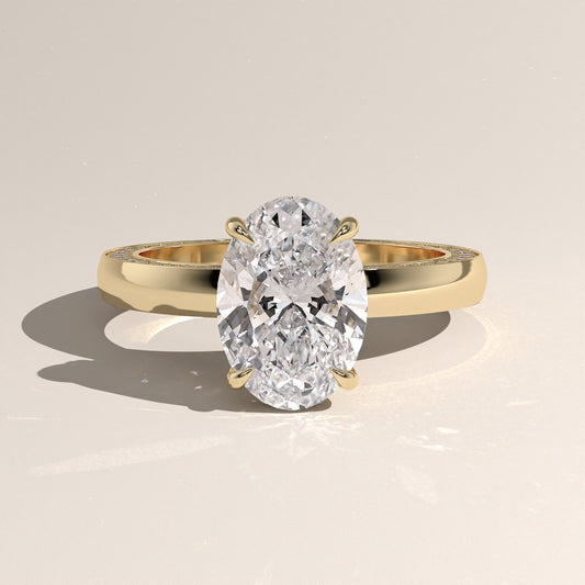 The Solitaire Cigar Pavé Band Oval Engagement Ring