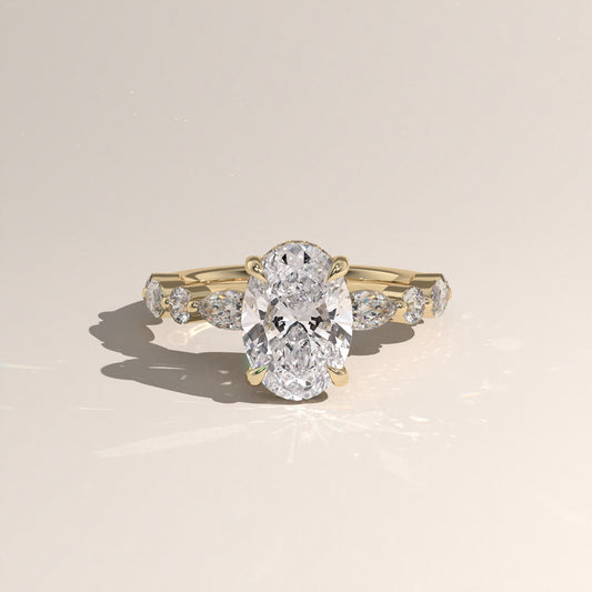The Oval Cut Hidden Halo with Marquise & Round Diamond Band Engagement Ring