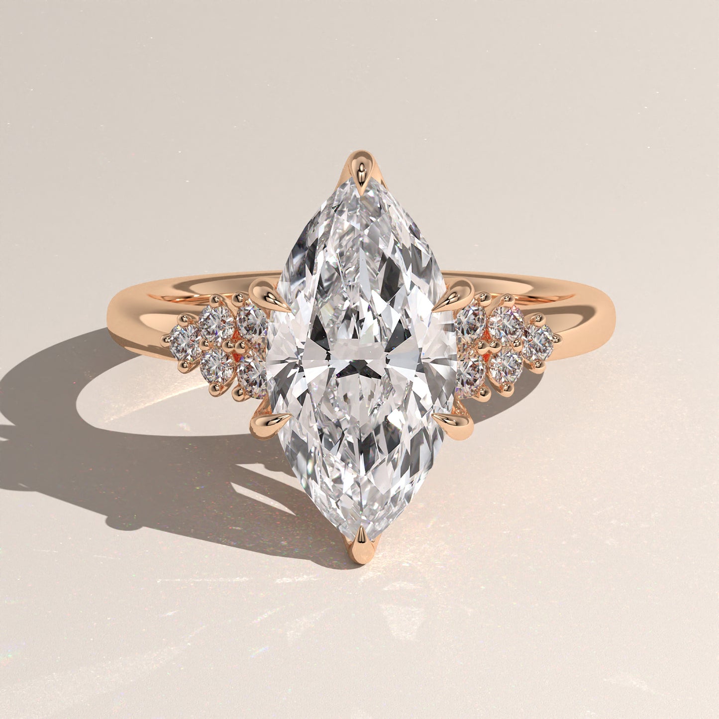 The Oval Claw Solitaire with Clustered Round Shoulder Stones Engagement Ring