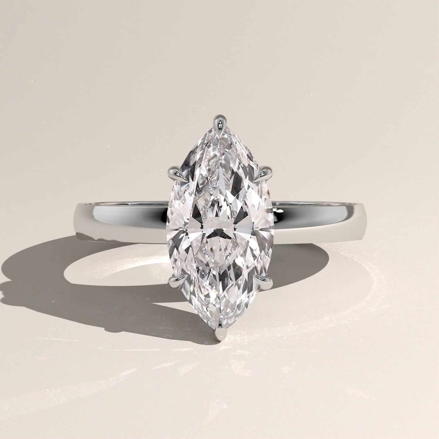The Solitaire Cigar Pavé Band Marquise Engagement Ring