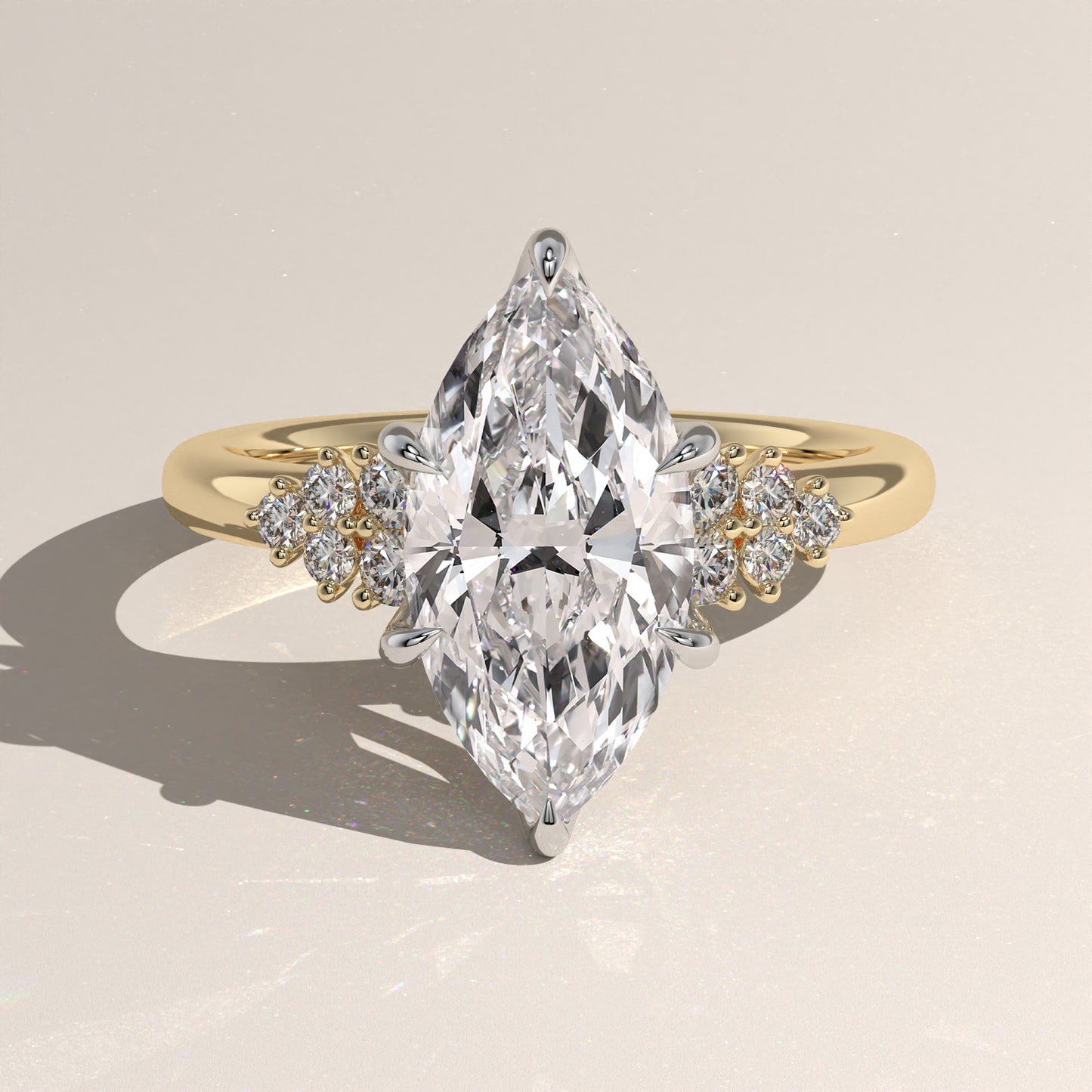 The Oval Claw Solitaire with Clustered Round Shoulder Stones Engagement Ring