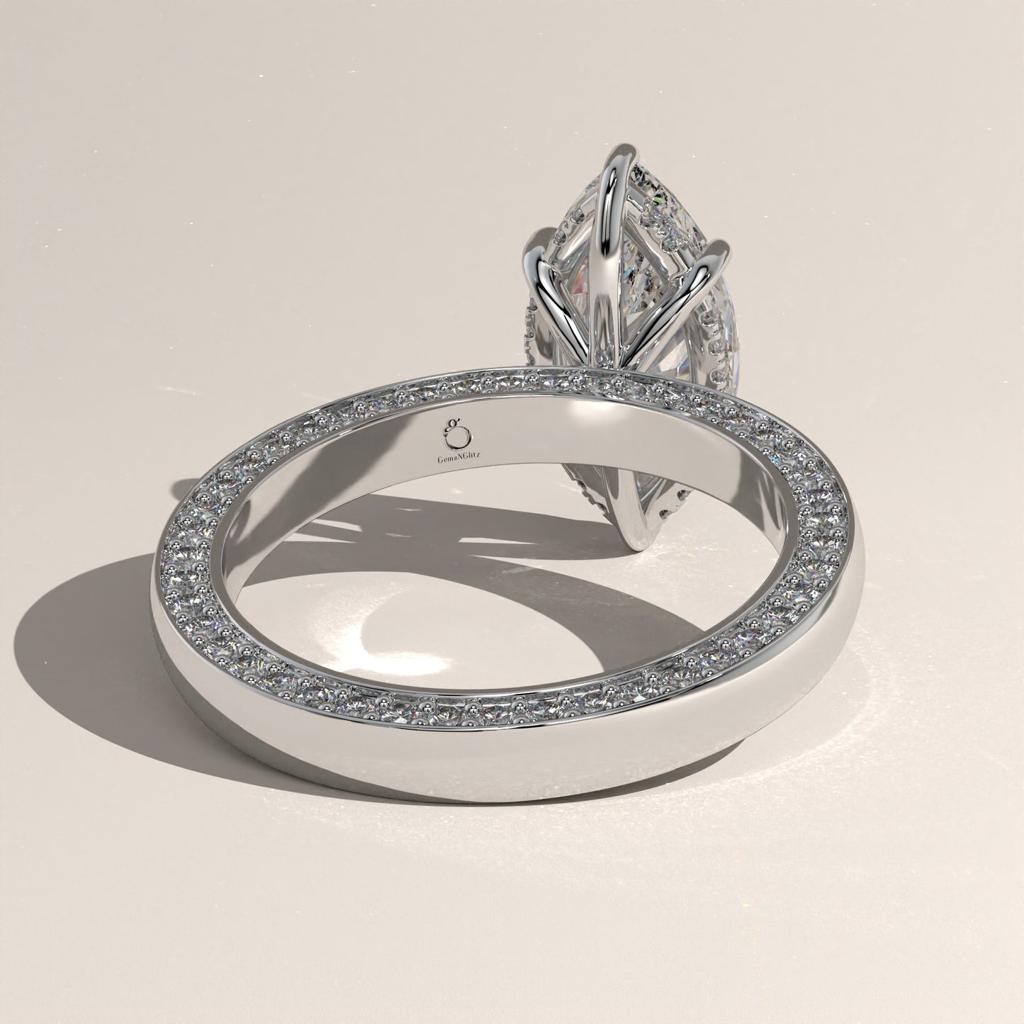 The Solitaire Cigar Pavé Band Marquise Engagement Ring