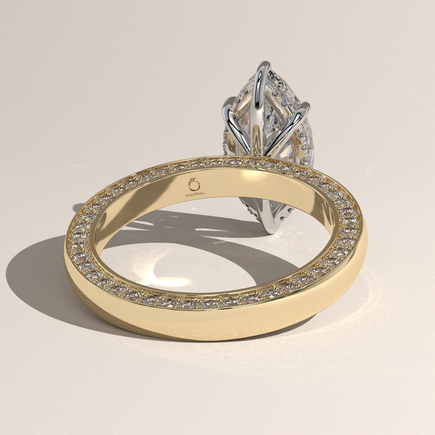 The Solitaire Cigar Pavé Band Marquise Engagement Ring