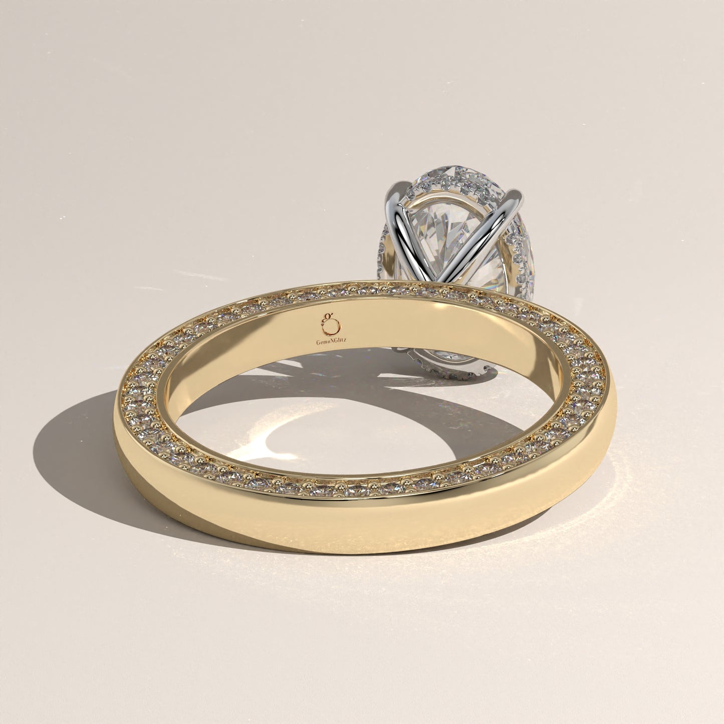 The Solitaire Cigar Pavé Band Oval Engagement Ring