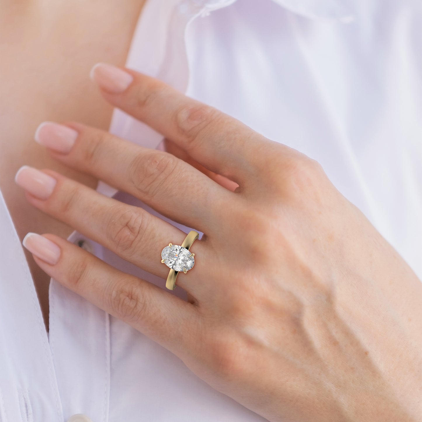 The Solitaire Cigar Pavé Band Oval Engagement Ring